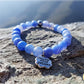 Bracelet enfant bleu perles naturelles 1.9 avec médaille Follow your dreams