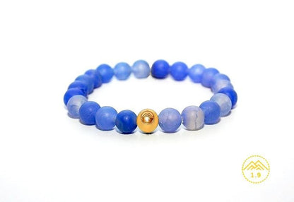 bracelet enfant en pierres naturelles d'agate bleue et perle dorée or de la marque 1.9