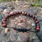 Bracelet shamballa mala tibétain et pierres naturelles Oeil de taureau (oeil de tigre rouge) sur cordon noir